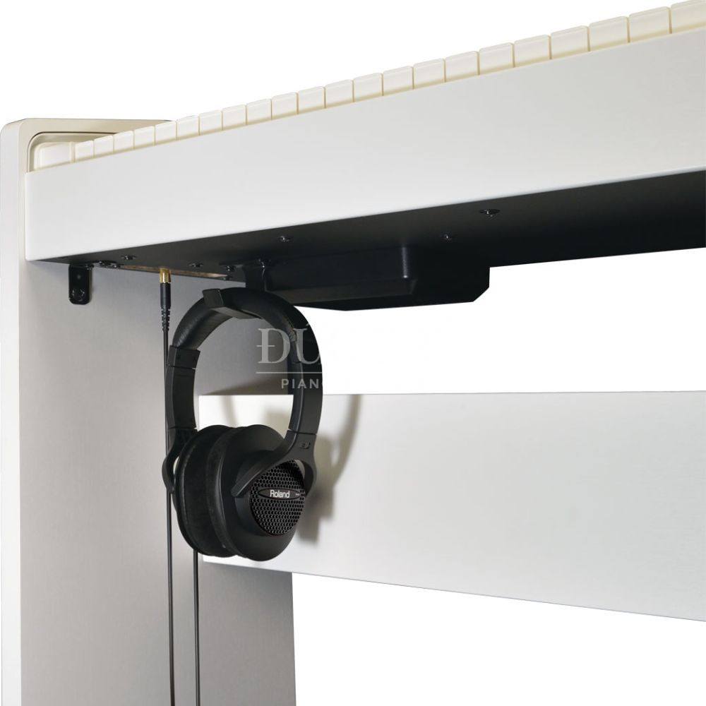 Ben duoi dan Roland F 130R Roland F-130R Bên dưới đàn Roland F-130R